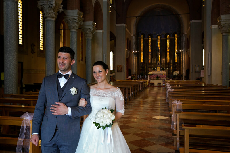 Servizio fotografico di matrimonio a Pordenone, chiesa di Santa Maria Concetta ad Eraclea. Michelino Studio, fotografo di matrimonio professionista in Veneto.
